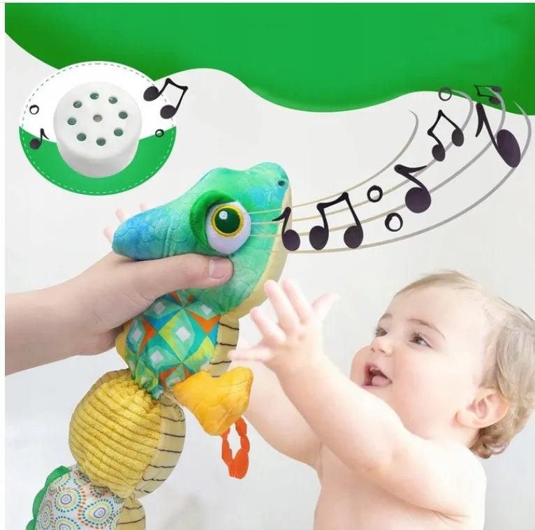Sensorinis žaislas kūdikiams pliušinis chameleonas muzikinis 0-1 metai