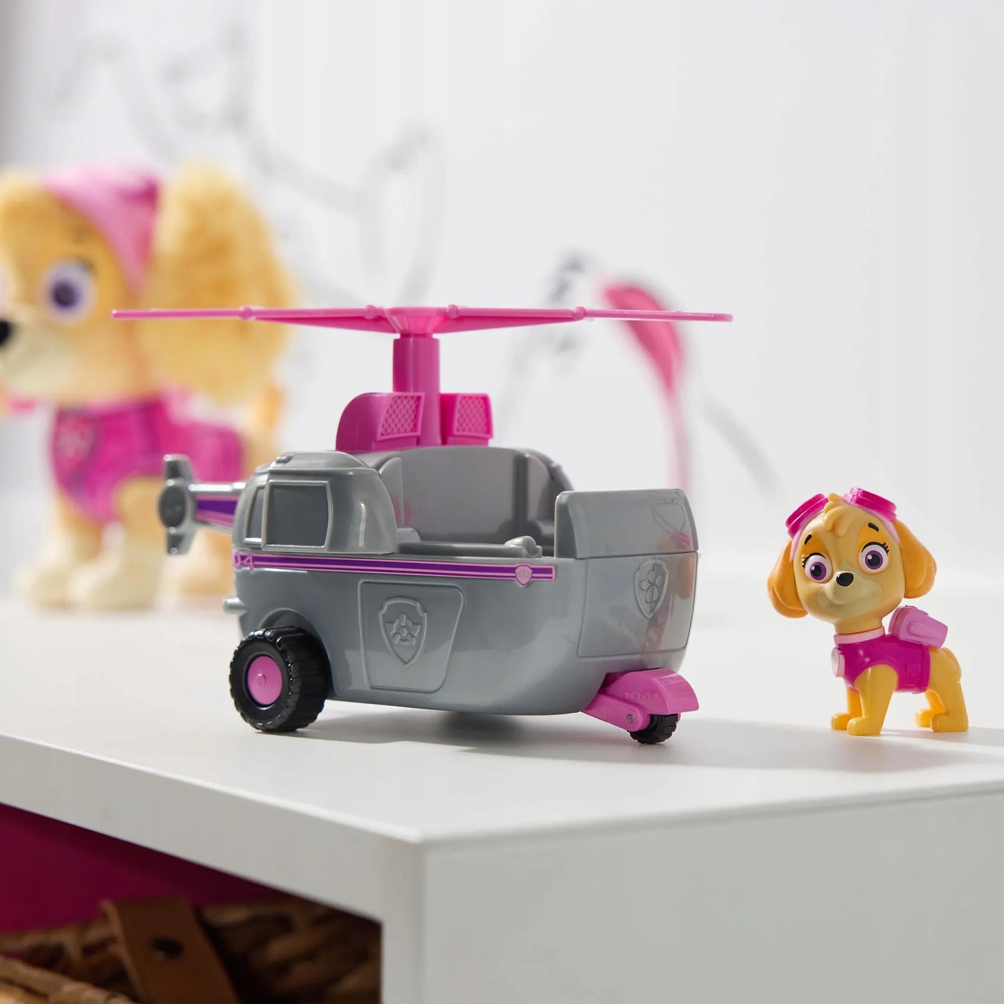 PAW PATROL SKYE SRAIGTASPARNIS GELBĖJIMO TRANSPORTO PRIEMONĖ + ŠUNIUKO FIGŪRĖLĖ
