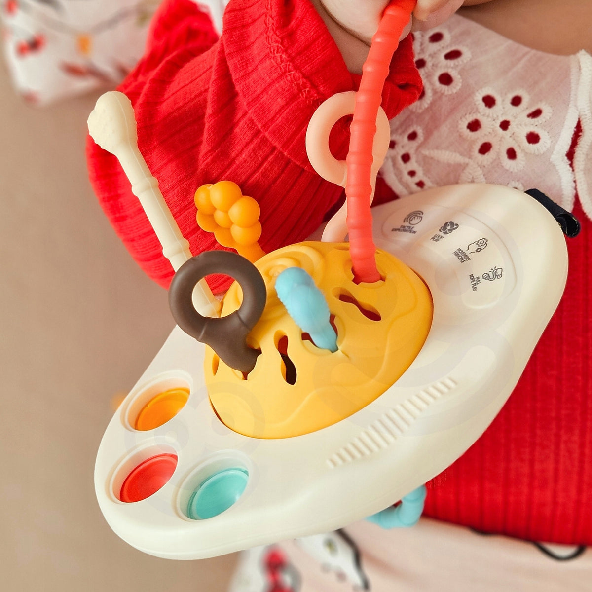 Woopie Baby Sensorinis Montessori Žaislas – Kramtukas-Barškutis UFO