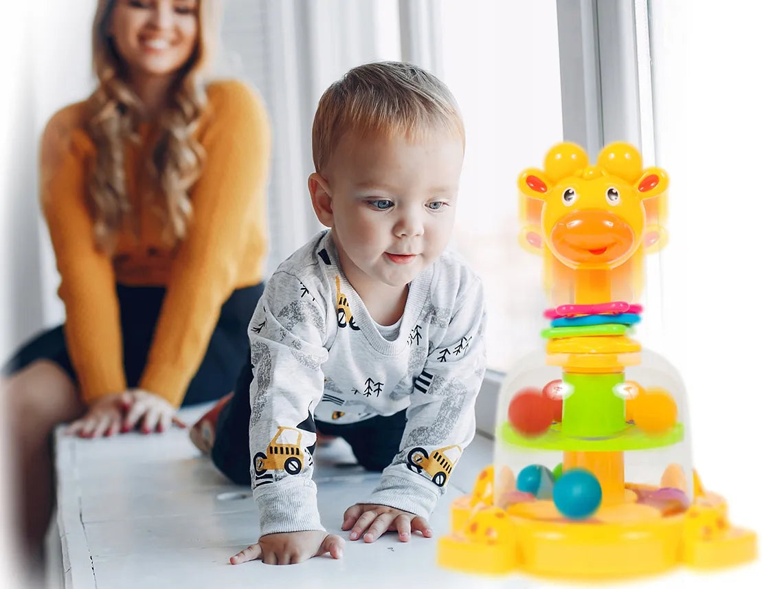 Besisukantis žaislas vaikams Žirafa su rutuliukais