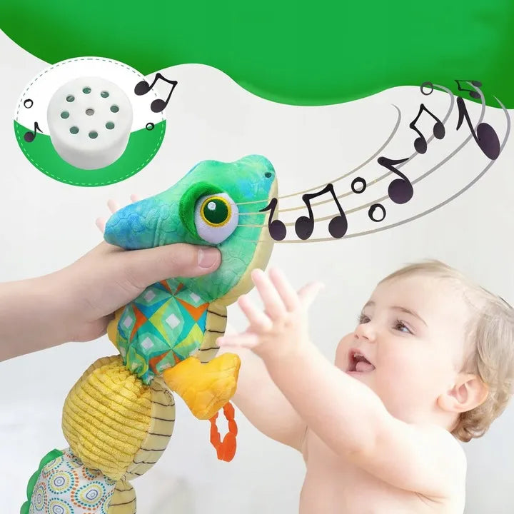 Sensorinis žaislas kūdikiams pliušinis chameleonas muzikinis 0-1 metai