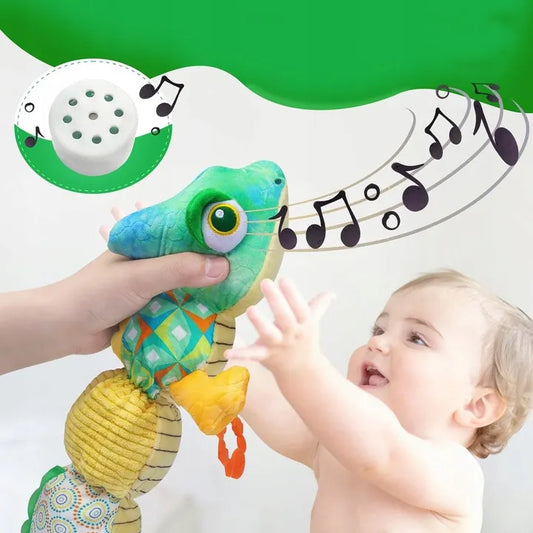 Sensorinis žaislas kūdikiams pliušinis chameleonas muzikinis 0-1 metai