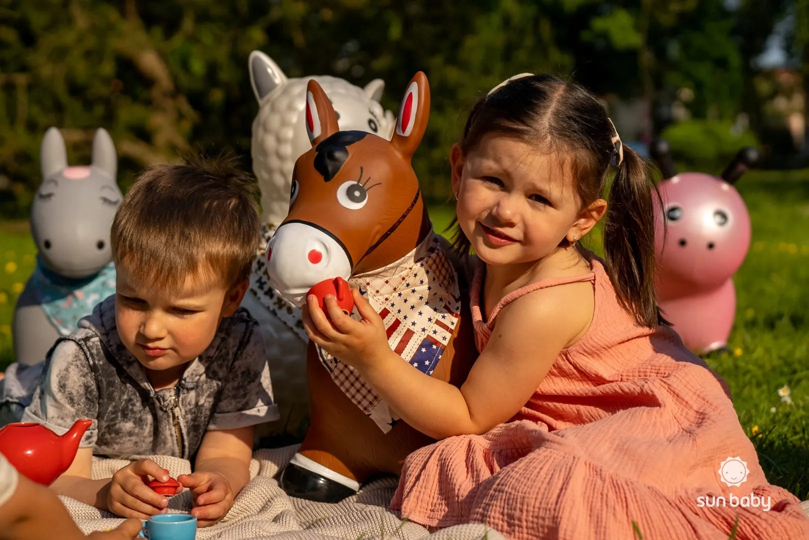 Sun Baby guminis šokliukas vaikams rožinė varlytė su pompa