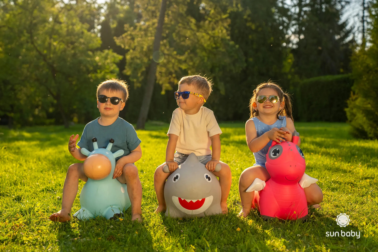 Sun Baby guminis šokliukas vaikams su pompa Reksio, baltas